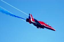 A Red Arrows Hawk aircraft pulls up from a dive during the Salthill Airshow. Sunday 6 July 2003. Photo: Joe Desbonnet.