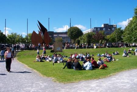 Galwegians enjoying a sunny day at Eyre Square, Galway. Galwegians enjoying a sunny day at Eyre Square, Galway.